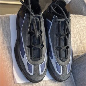 Adidas Black and Gray Sneakers with Sleek Design and Chunky Sole